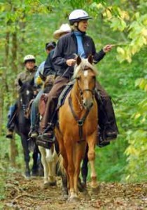 Midwest Trail Ride:  A Vacation To Paradise By Kim Humphries    Midwest Trail Ride is nestled in the hills of south central Indiana; among the hardwood and pine trees.  1-½ hours south of Indianapolis and 1-½ hours north of Louisville Kentucky, is a trail riding paradise!  Bring your own horse (or rent one of ours), and spend two or three days exploring the beautiful Hoosier National Forest.  We are open every day thru the summer season for open camping; 8 weekends a year we have special “organized rides” where we prepare 3 buffet meals per day.   See our website for those dates and details - www.midwesttrailride.com.