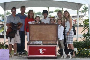 Two Winners Unlock Big Prizes from Vita Flex at the Adequan Global Dressage Festival and the FTI Winter Equestrian Festival  Wellington, FL (April 8, 2014) – “When I put the key in and it opened, I got goose bumps. It was great,” dressage rider Paula Matute said about the key that matched the lock of a Vita Flex prize trunk at the Adequan Global Dressage Festival on March 14, 2014. Young rider Isabella Sica shared Matute’s excitement when she unlocked the prize trunk at the FTI Consulting Winter Equestrian Festival the next day. All riders who won a class at either the Adequan Global Dressage Festival or the Winter Equestrian Festival in Wellington, Florida were given a key along with their winning ribbon. Every rider hoped that their key would be the one to open the Vita Flex trunk filled with equestrian products.