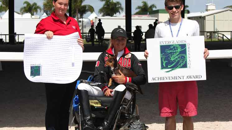 Everglades Dressage Rider Achievement Award Winner Lauren Barwick: Off to Paris and Beyond Wellington, FL (March 21, 2014) - In dressage, it's all about consistency. Just ask three-time (2004, 2008, 2012) Canadian Para-Olympic Equestrian veteran Lauren Barwick, whose consistently winning ways continued through week 10 of the Adequan Global Dressage Festival and CPEDI3* with accepting the Everglades Dressage Rider Achievement Award from sponsor, fellow dressage champion, and owner of Everglades Dressage, Bethany Peslar.