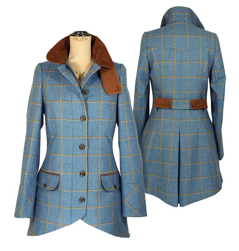 This gorgeous Timothy Foxx Catherine Jacket in Foxglove Tweed is a new take on their classic Catherine Jacket. Styled in the brand’s own bespoke Foxglove Tweed it features a gorgeous Gold and Chocolate plaid on a Cool Blue based tweed. Cut to flatter with it’s feminine shape, the jacket features a stunning Tan Brown corduroy fabric on the collar and pocket trims and a two tone dog tooth viscose lining on the inside the jacket.