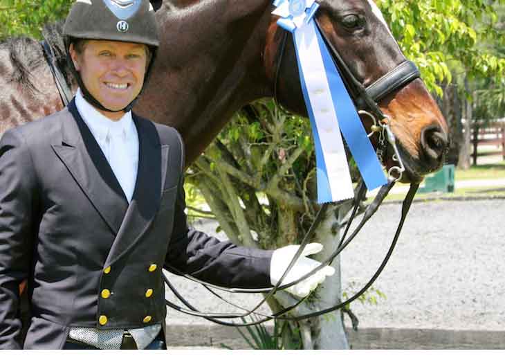 John Zopatti and Fabio Bringing Home the Blue Gold Coast Dressage Grand Finale 2 Wellington, FL (April 24, 2014) – For 18 years, dressage rider and trainer John Zopatti and an Oldenburg called Fabio have been an unstoppable horse-and-rider team. This past weekend, they did it again—Zopatti and Fabio won the FEI Intermediate B Open GAIG/USDF Qualifying division of the Gold Coast Dressage Grand Finale 2 in Wellington, Florida. “We know each other’s good and bad points, and it’s fun to try to show off the good points,” Zopatti said of his long-time equine partner. The pair certainly showed off the “good points” in the I-2 at Gold Coast Dressage.