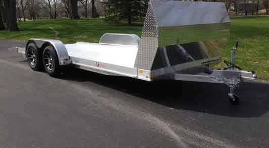 Kiefer Manufacturing has introduced the all aluminum Car Hauler trailer. This trailer has 18-feet of bed length covered with extruded interlocking aluminum floor running lengthwise for maximum strength and almost 82” between fenders. This provides much more room to haul larger vehicles than most comparative trailers in the market today.
